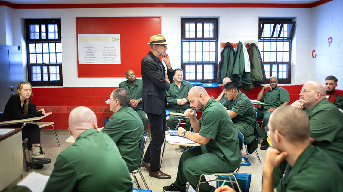 As part of the Cornell Prison Education Program, Joseph Margulies, professor of practice in the Department of Government in the College of Arts and Sciences, teaches students at Cayuga Correctional Facility in Moravia, New York, in 2020. Teaching assistant Hailey Shapiro ’22, left, looks on.