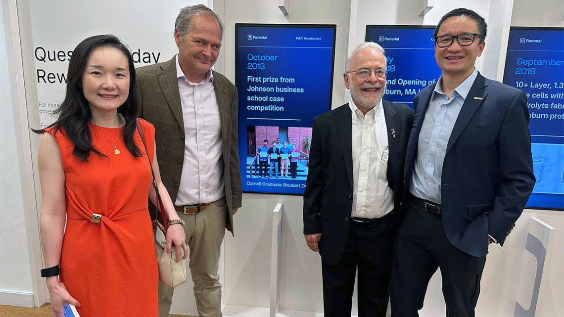 From left, Siyu Huang, Ph.D. ’12, Wesley Sine, MBA ’14, Héctor D. Abruña and Alex Yu, Ph.D. ’14, celebrate Facorial’s debut on the Nasdaq Sock Market.