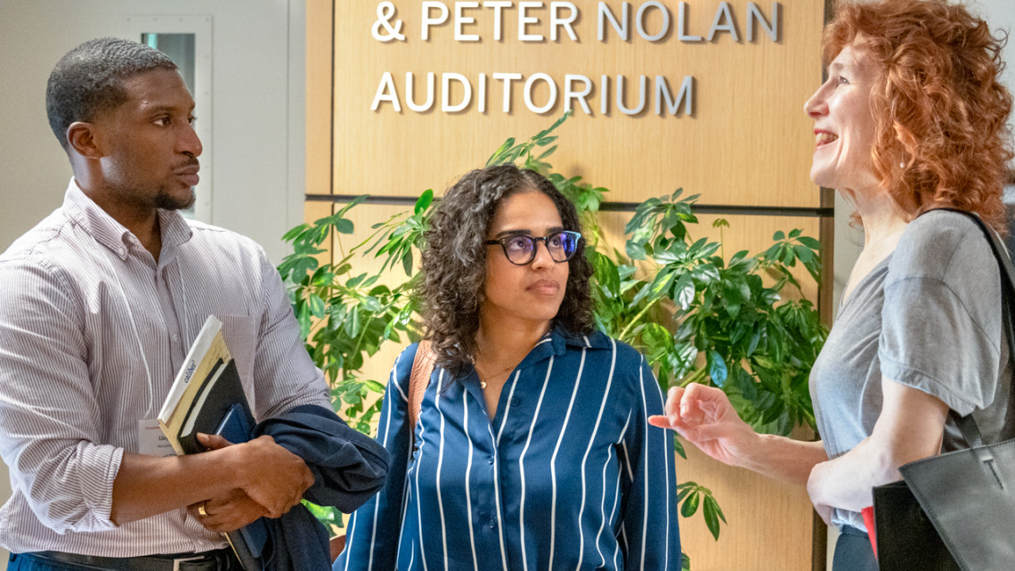 Lloyd Talley (left), assistant professor of psychology at Hampton University and Elianny Edwards (right), assistant professor of psychology at the College of the Holy Cross chat with Kim Kopko, managing director of the Purpose Science and Innovation Exchange.