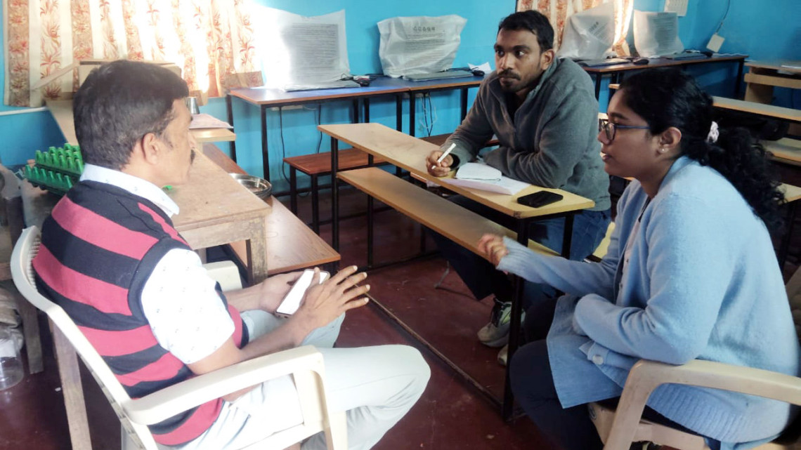 Deepak Varuvel Dennison, a Ph.D. student in the field of information science at Cornell (center) and Rijutha Raj from Sikshana Foundation (right) talk with a middle school teacher to understand their experience using Shiksha Copilot.