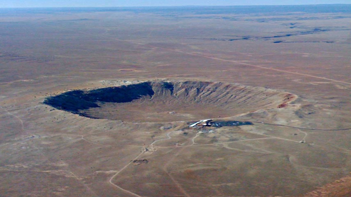 A large crater in the desert known as the Barringer Meteor Crater in northern Arizona
