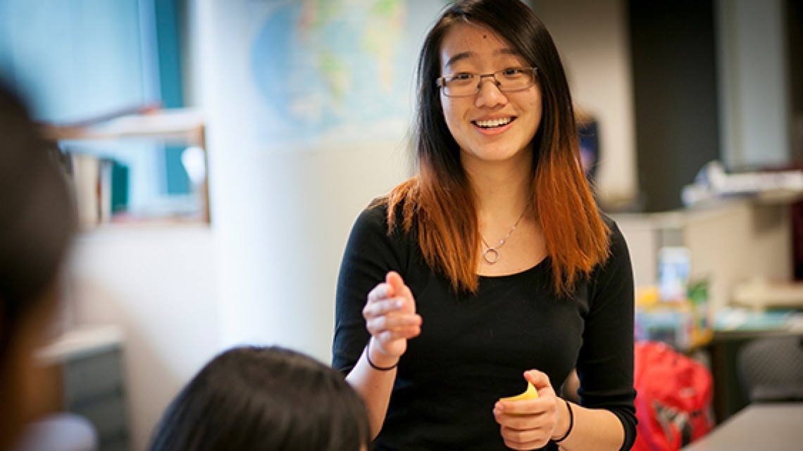 Female student taking a pubic speaking course during the summer