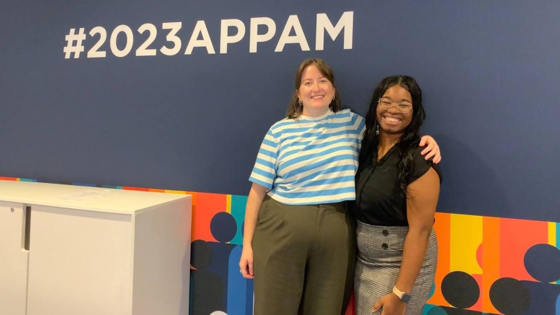 Chloe Smith and Jillian Royal doctoral students at the Cornell Jeb E. Brooks School for Public Policy at the 2023 Association for Public Policy Analysis and Management (AAPAM) conference 