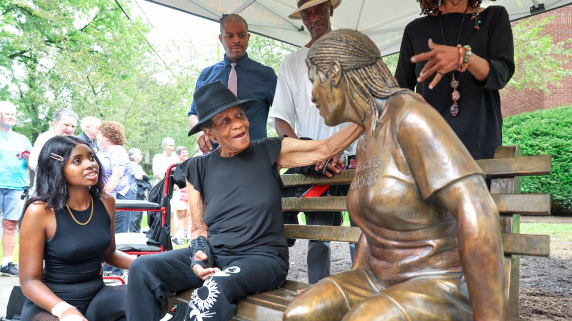 Aisha Imani Nixon, left, joined her great-grandmother Lucy Brown at the statue portraying Brown on Aug. 17.