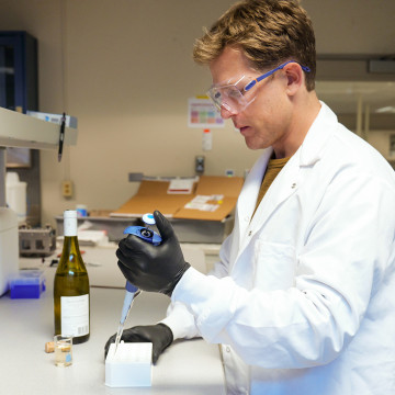 Terry Bates prepares samples in the Quantera lab. The Curio grew out of his doctoral research in Gavin Sacks’s lab at Cornell.