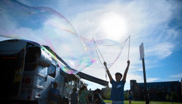 Making giant bubbles on North Campus. 