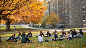 Classes meet on a the Arts Quad on a beautiful fall afternoon.