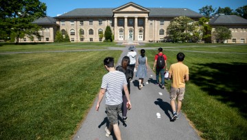 Students head toward Goldwin Smith Hall.
