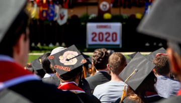 The graduates and a Cornell 2020 banne. 