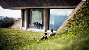 A student finds a quiet place to study outside Uris Library.