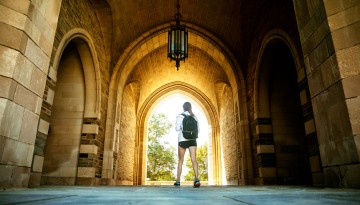 Law students pass through the arches of Myron Taylor Hall.