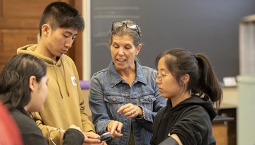 Senior lecturer, Darlene Campbell works with students in the classroom