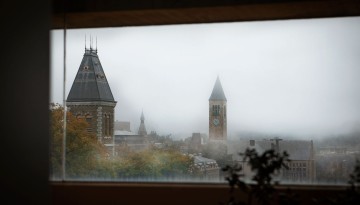 A foggy view of McGraw Tower from the Herbert F. Johnson Museum of Art.