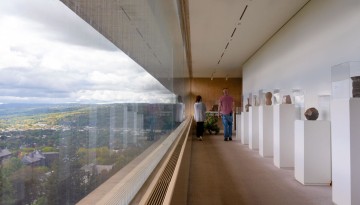 Visitors wander through the top floor of the Herbert F. Johnson Museum of Art.