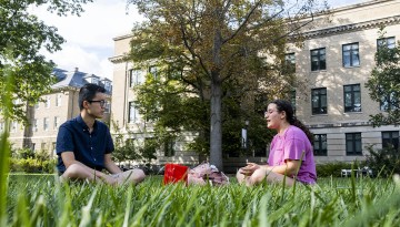 Students hang out in the afternoon sun on the Ag Quad.