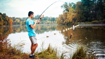 A student enjoys the rewards of fishing in Beebe Lake.