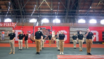 West Point cadets practice drills in Barton Hall.