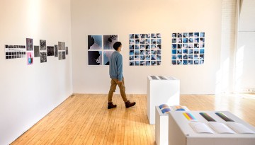 A student checks out the Experimental Gallery in Tjaden Hall.
