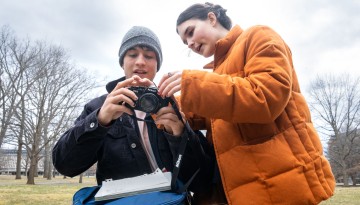 Students explore some film photography on the Arts Quad.