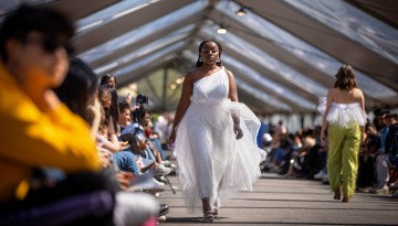 Students wait to walk the runway in the Cornell Fashion Collective Spring Runway Show on the Arts Quad.