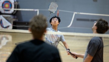 Students get into a game of badminton at Helen Newman Hall.