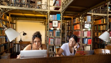Students work in the AD White Library.