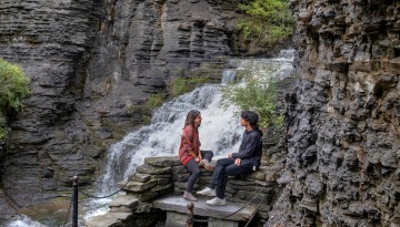 Friends have a conversation on the Cascadilla Gorge trail.
