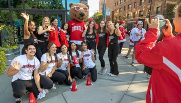 Touchdown joins the Cornell WomenÆs and Men’s hockey team promotional event in Collegetown.