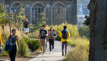 Students detour around McGraw Tower at the top of Libe Slope.