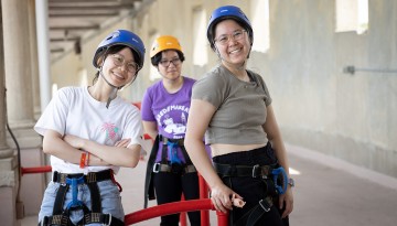 Students wait their turn for Senior Days rappelling at Schoellkopf Stadium.