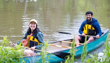 Reunion 2024 attendees in a canoe
