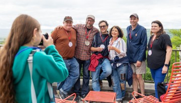 Reunion 2024 attendees pose for a photo