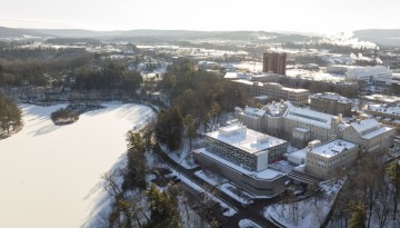 Beebe Lake and Martha Van Rensselar Hall are seen on a snowy morning.