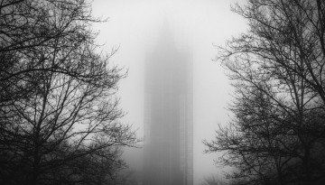 McGraw Tower is enshrouded in fog.