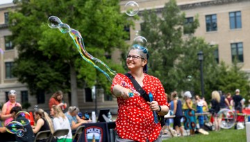 Bubbles help make the party during Cornell Summer Wellbeing Adventure’s Chillin’ on the Quad Party.