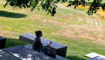 A student works on Libe Slope.