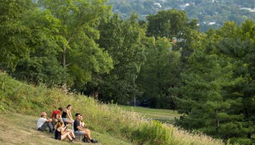 Students enjoy the evening light on The Slope.