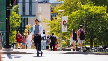 Students cross Campus Road on their way to class..