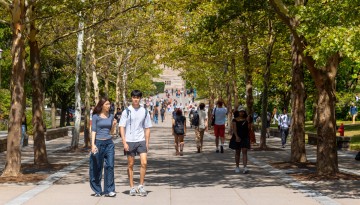 Students walk on Ho Plaza.