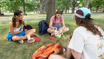 Students relax on the Arts Quad.