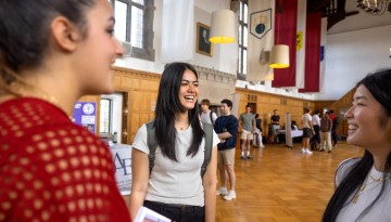 The Professional Fraternity Council holds an event in Willard Straight Hall.