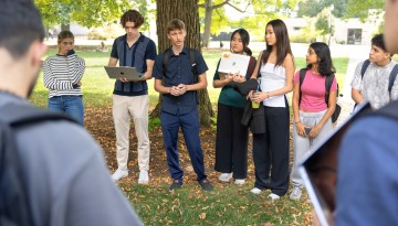 Sarah Jefferis’ class meets on the Ag Quad to discuss writing as a way to support sustainability.