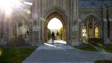 Students head into the sunset through a newly restored War Memorial.