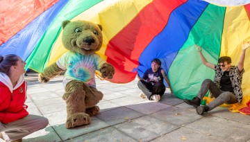 Touchdown joins students for fun on the Arts Quad.