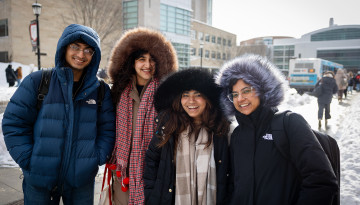 Students outside Sage Hall.