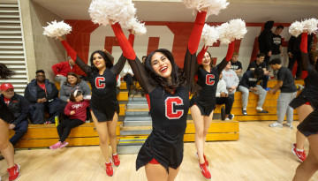 Cheerleaders celebrate as Cornell beats Brown.