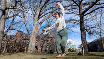 Cornell Slackers Club slackline on the Arts Quad.