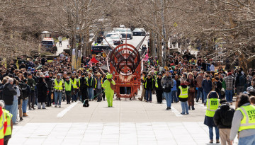 Wide shot of the dragon and parade on Ho Plaza. 