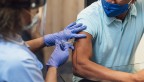 Man getting Covid-19 vaccine shot